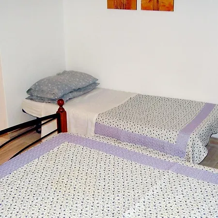 Apartment Maslinica 5180c *